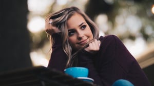 confident girl with coffee