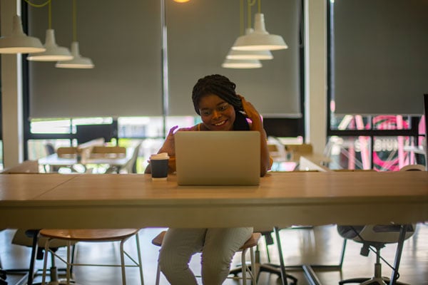 portrait-of-woman-at-desk